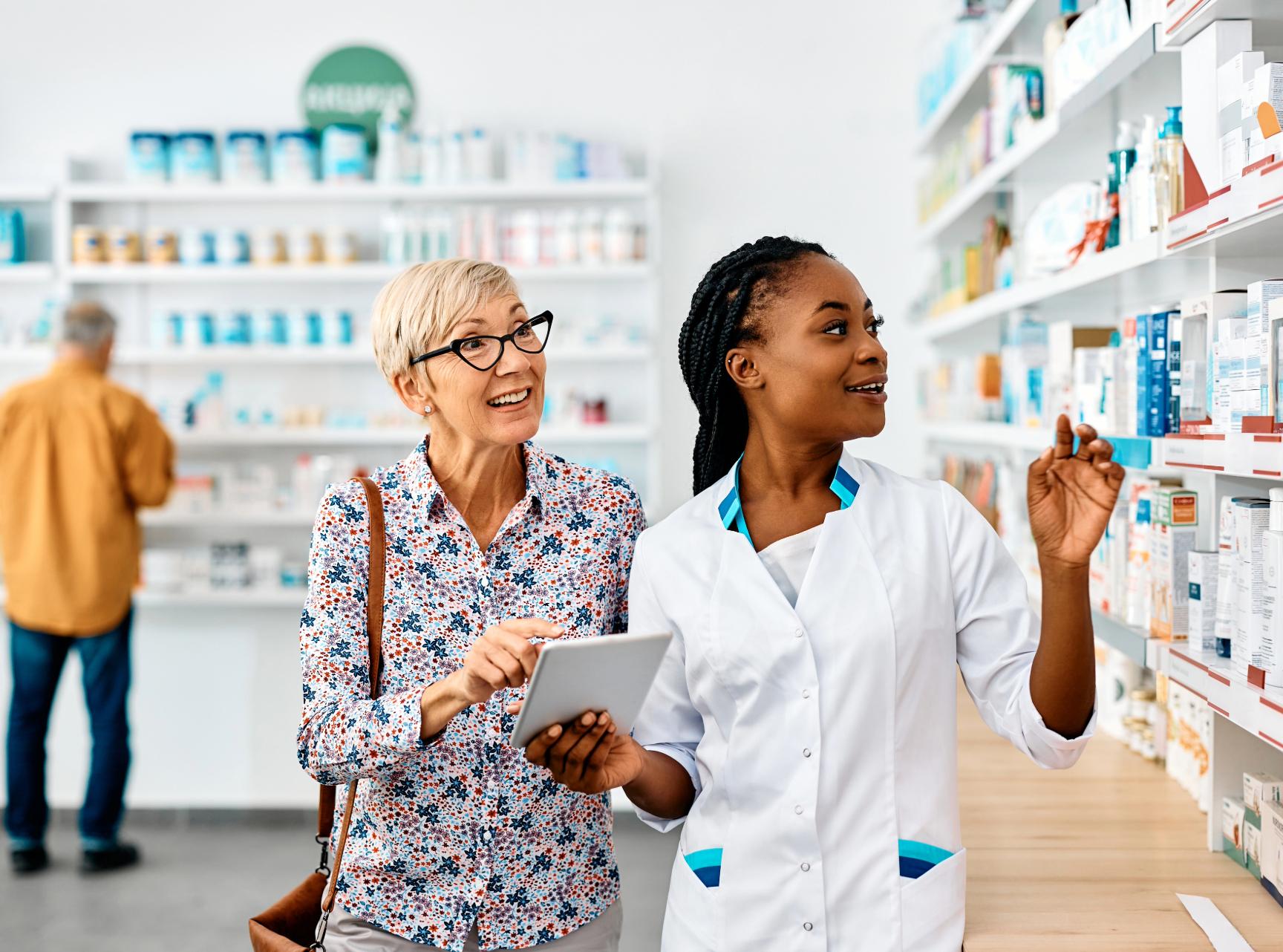 Pharmacy Apprentice with customers